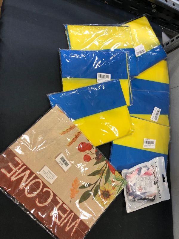 Photo 1 of  BAG LOT MISC ITEMS UKRAINE FLAGS ETC..