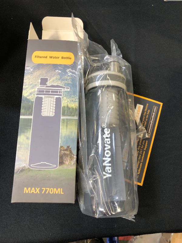 Photo 1 of YaNovate Filtered Water Bottle, Portable Grade Filter 2-Stage Integrated Water Purifier with Replaceable Filter for Camping, Endurance Sports, Hiking and Backpacking, BPA Free, 26 Oz
