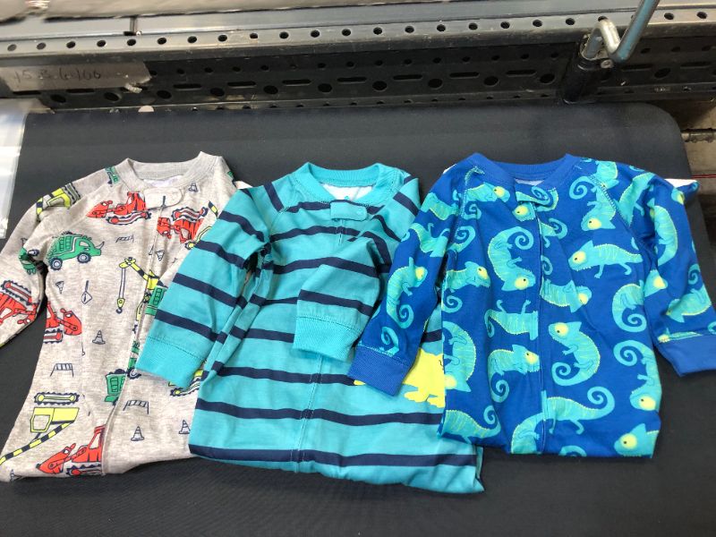 Photo 1 of Simple Joys by Carter's Baby Boys' 3-Pack Loose Fit Polyester Jersey Footed Pajamas Size 12M