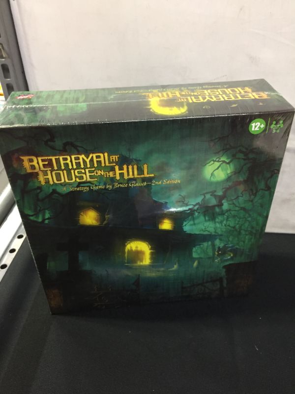 Photo 2 of Hasbro Gaming Avalon Hill Betrayal at The House on The Hill Second Edition Cooperative Board Game, Ages 12 and Up, 3-6 Players, 50 Chilling Scenarios
FACTORY SEALED 
