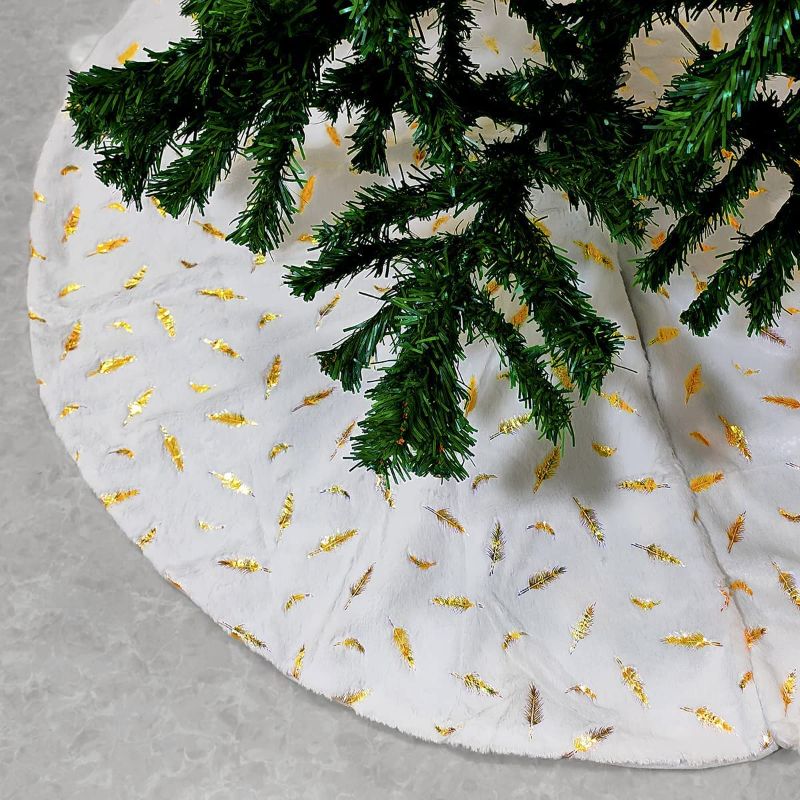 Photo 1 of Christmas Tree Skirt 48 Inches Faux Fur White Large Tree Skirt Golden Feathers Tree Skirt for Christmas Tree Decorations