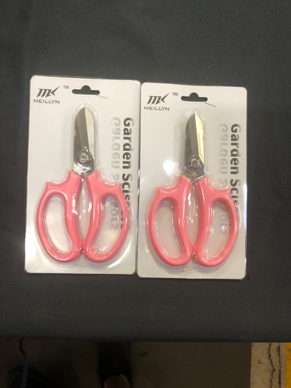 Photo 1 of 2 pairs of garden scissors 