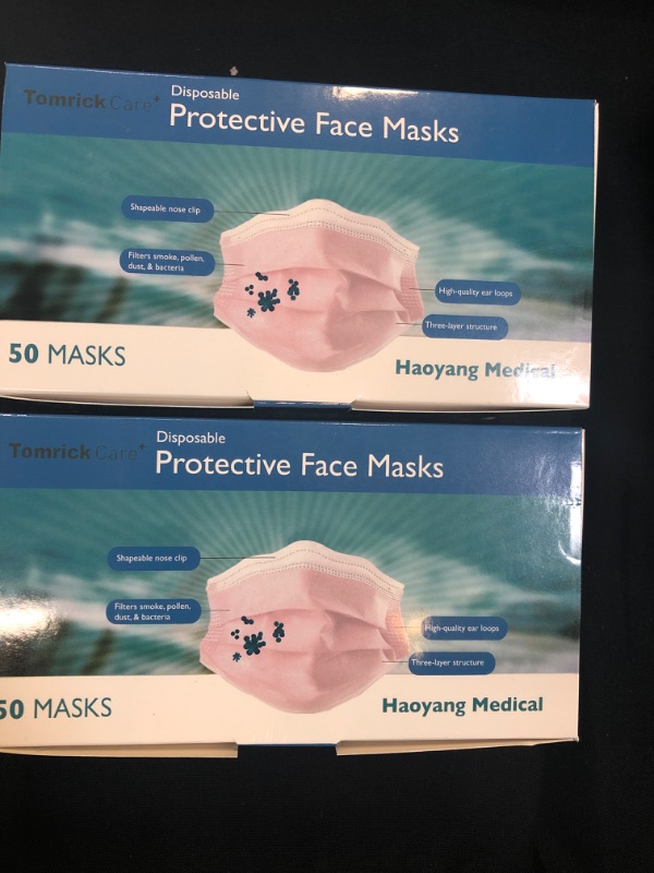 Photo 1 of 2 boxes of 50 face masks