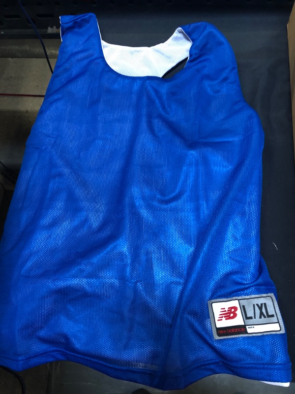 Photo 1 of NEW BALANCE YOUTH JERSEY BLUE L/XL