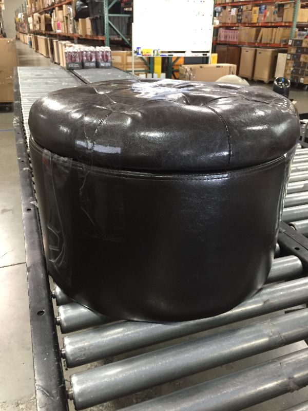 Photo 1 of 1 FT ROUND BROWN OTTOMAN W/ STORAGE