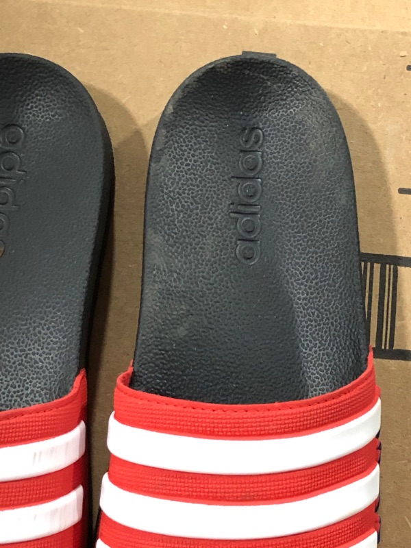 Photo 1 of adidas Kids' Adilette Shower K Slide Sandal (SIZE 4 big kid) 