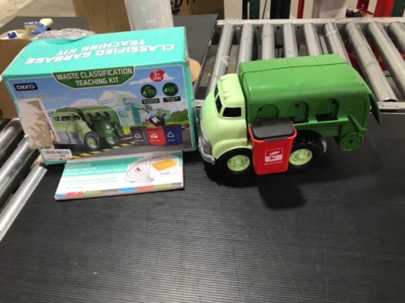 Photo 2 of FUN LITTLE TOYS Garbage Truck Toy with 4 Rear Loader Trash Cans and Garbage Illustrated Flash Cards, Waste Management Recycling Truck Toy for Kids
