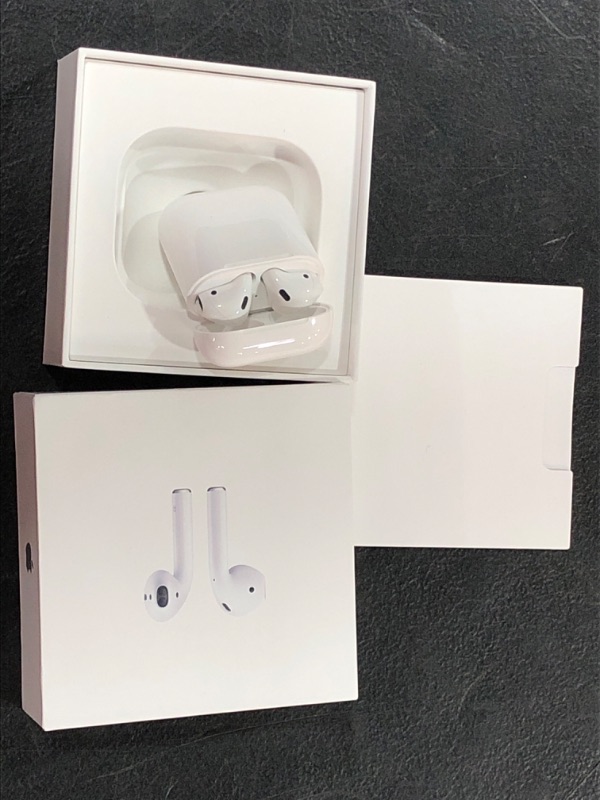 Photo 2 of Apple AirPods with Charging Case (Latest Model)