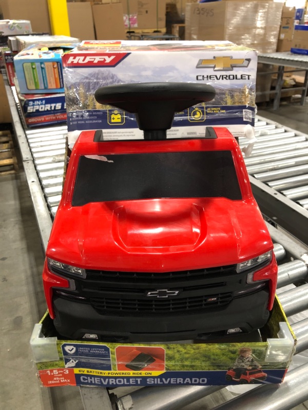 Photo 2 of Kids 6V Chevy Silverado Truck Ride-on Red by Huffy. PRIOR USE, RETURN ITEM.
