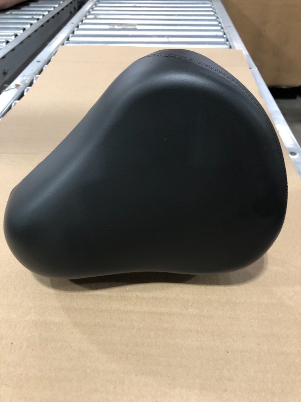 Photo 1 of UNIVERSAL PADDED BICYCLE SEAT. BLACK. PRIOR USE. DAMAGE TO SEAT POST