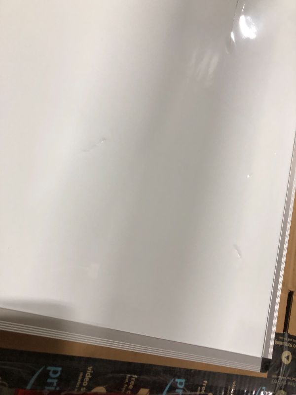 Photo 3 of VIZ-PRO Magnetic Dry Erase White Board, 31 X 47 Inches, Black Aluminium Frame CUT AND DENTED IN SPOTS

