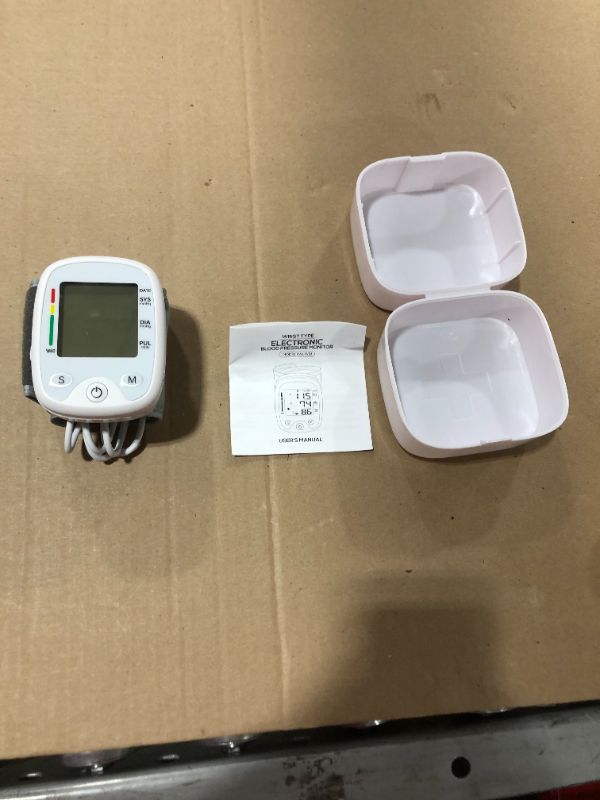 Photo 2 of Blood Pressure Monitor Digital Wrist BP Machine with Irregular Heartbeat Indicator Automatic BP Cuff with 2 Users 180 Memory Voice Large LCD Display Adjustable Cuff USB Charging
