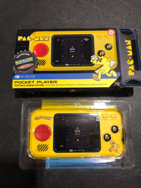 Photo 4 of My Arcade Pocket Player Handheld Game Console: 3 Built In Games, Pac-Man, Pac-Panic, Pac-Mania, Collectible, Full Color Display, Speaker, Volume Controls, Headphone Jack, Battery or Micro USB Powered. OPEN BOX.
