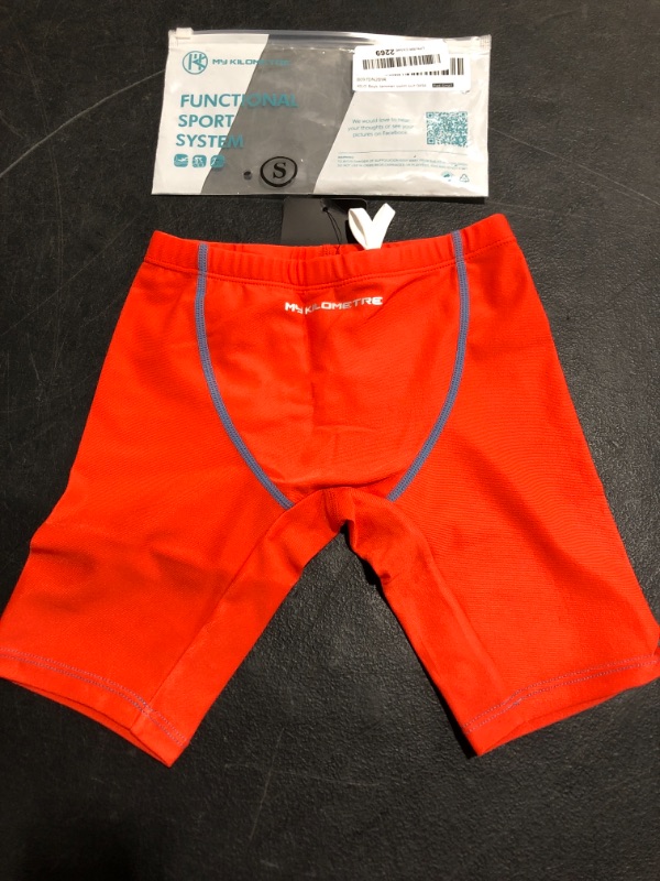 Photo 1 of MY KILOMETRE KILO BOYS JAMMER SWIM SUIT, ORANGE, SIZE SMALL.