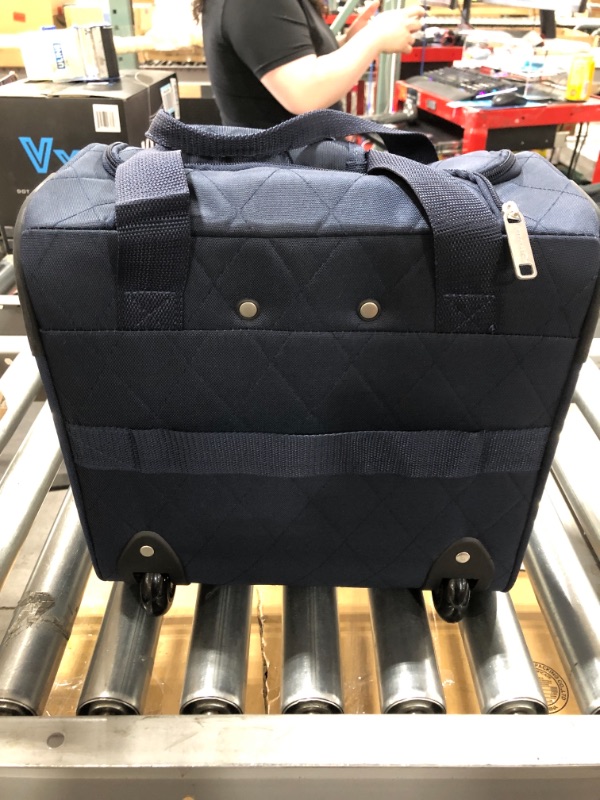 Photo 4 of Amazon Basics Underseat Carry-On Rolling Travel Luggage Bag, 14 Inches, Navy Blue Quilted. OPEN BOX.
