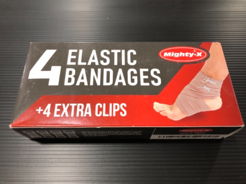 Photo 1 of Premium Elastic Bandage Wrap - 4 Pack + 12 Extra Clips - Durable Compression Bandage (2X - 3 inch, 2X - 4 inch Rolls) Stretches up to 15ft in Length
