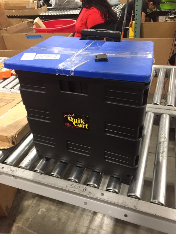 Photo 2 of dbest products Quik Cart Collapsible Rolling Crate on Wheels for Teachers Tote Basket, 80 lbs Capacity, Blue Lid Made from Heavy Duty Plastic and used as a Seat
