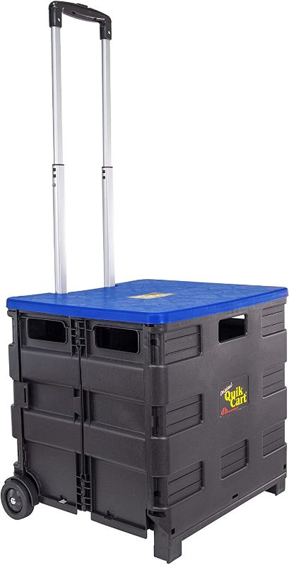 Photo 1 of dbest products Quik Cart Collapsible Rolling Crate on Wheels for Teachers Tote Basket, 80 lbs Capacity, Blue Lid Made from Heavy Duty Plastic and used as a Seat
