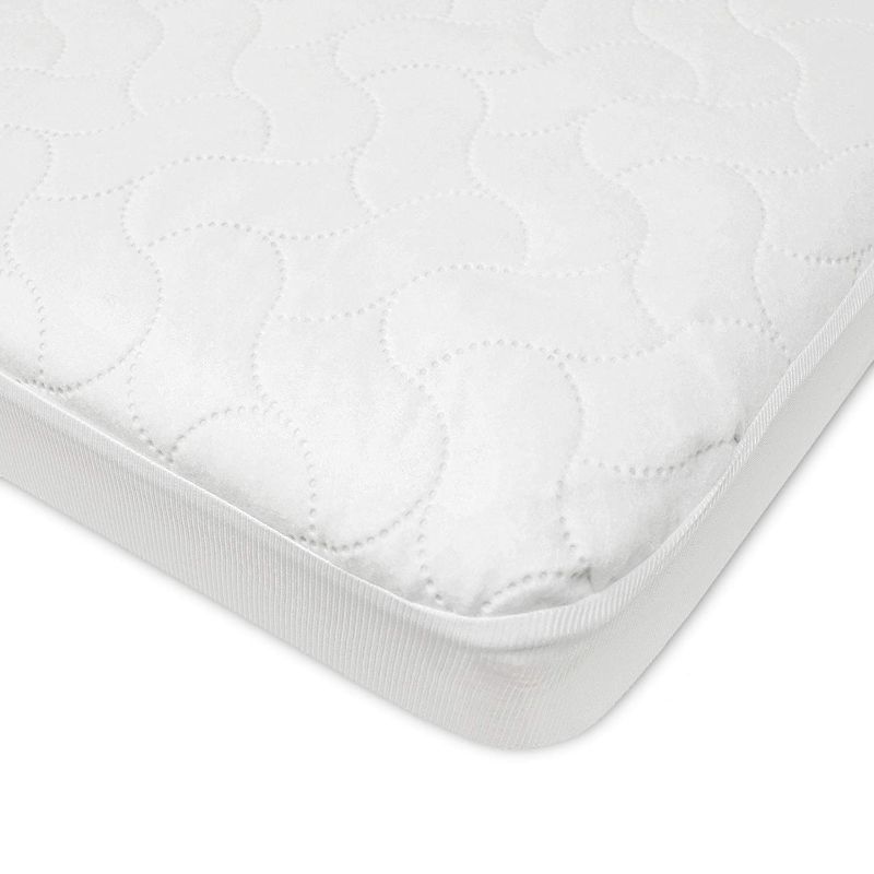 Photo 1 of American Baby Company Waterproof Fitted Crib and Toddler Protective Mattress Pad Cover, White, for Boys and Girls, 52x28x9 Inch (Pack of 1)
