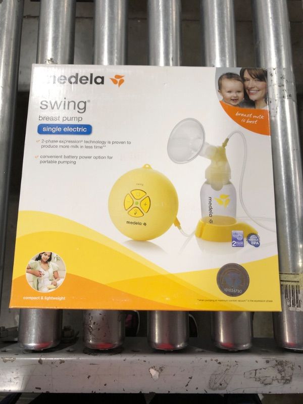 Photo 2 of Medela, Swing, Single Electric Breast Pump, Compact and Lightweight Motor, 2-Phase Expression Technology, Convenient AC Adaptor or Battery Power, Single Pumping Kit, Easy to Use Vacuum Control
