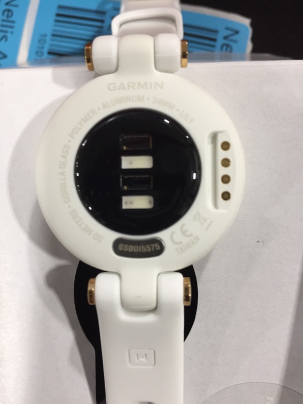 Photo 3 of Garmin Lily, Small GPS Smartwatch with Touchscreen and Patterned Lens, Light Gold with White Leather Band 