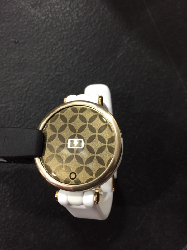 Photo 2 of Garmin Lily, Small GPS Smartwatch with Touchscreen and Patterned Lens, Light Gold with White Leather Band 