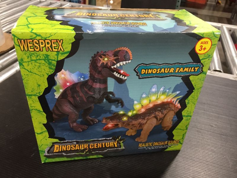 Photo 2 of 2 Pack Electronic Walking Dinosaur Toy with LED Light Up Eyes, Roaring Sound, Realistic Spinosaurus and Stegosaurus, Dinosaur Party Favors, Dinosaur Toy for Kids Boys Girls Ages 3 4 5 6 7 Year Old
