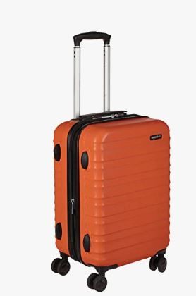 Photo 1 of AMAZONBASICS HARDSIDE CARRY ON SPINNER TRAVEL LUGGAGE SUITCASE - 21 INCH, ORANGE
