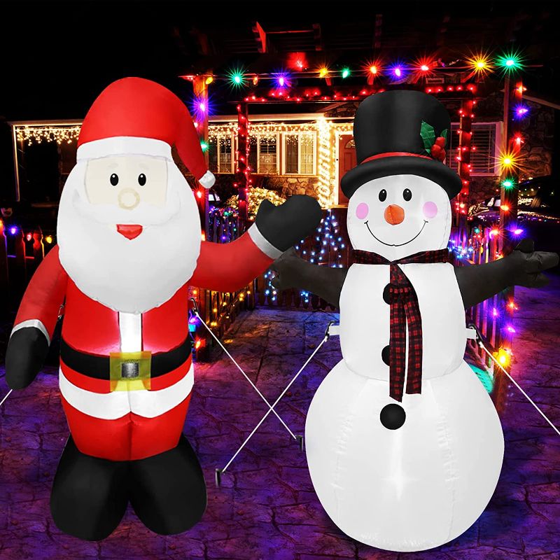 Photo 1 of Christmas Inflatables Outdoor Decorations, Set of 2 Inflatable Santa Claus and Snowman, 4FT Christmas Blow Up Yard Decorations with Built-in LED Lights for Outdoor,Holiday,Yard,Garden,Lawn Decor
