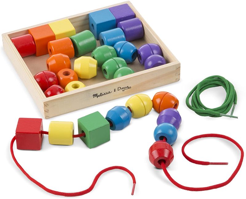 Photo 1 of Melissa & Doug Primary Lacing Beads - Educational Toy With 30 Wooden Beads and 2 Laces