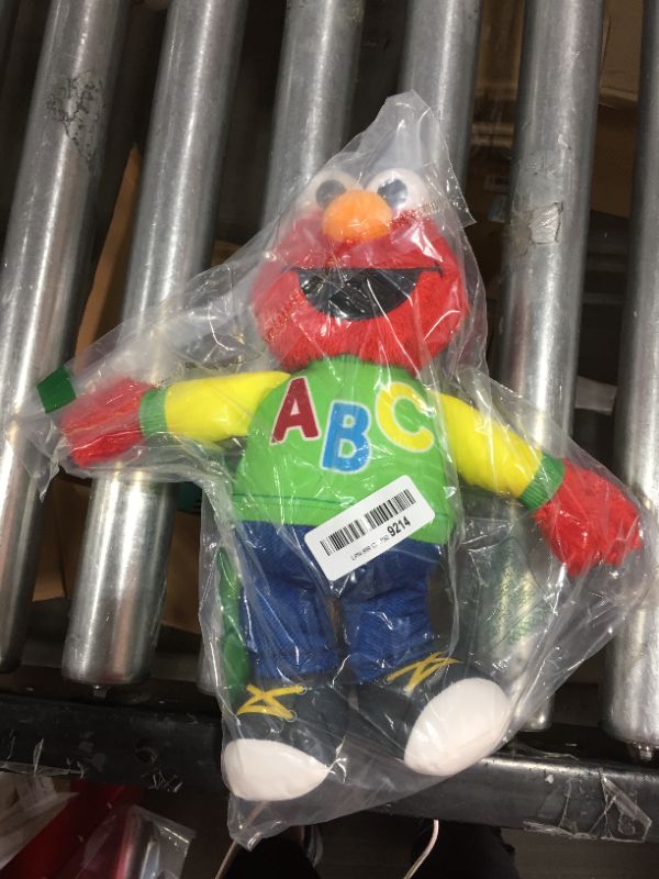 Photo 2 of Elmo speaking doll. Learn your ABC's in Spanish!