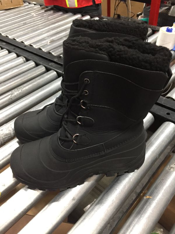 Photo 1 of Black snow boots. size 11