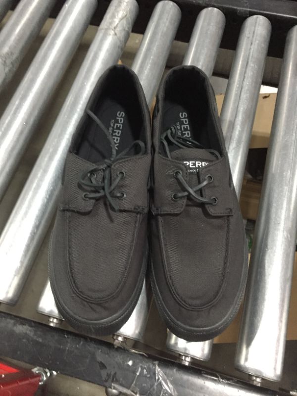 Photo 1 of Black shoes. 11.5