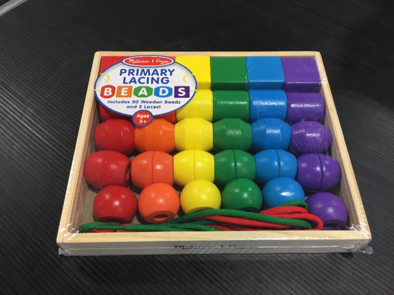Photo 2 of Melissa & Doug Primary Lacing Beads - Educational Toy With 30 Wooden Beads and 2 Laces
