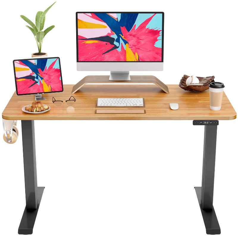 Photo 1 of FAMISKY Standing Desk Dual Motors, Adjustable Height Electric Stand up Desk, 48 x 24 Inches