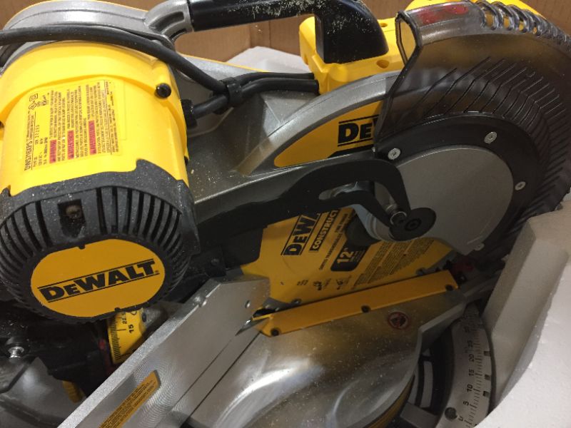 Photo 2 of DEWALT Miter Saw, 12-Inch, Double Bevel, Compound, XPS Cutline, 15-Amp (DWS716XPS)
