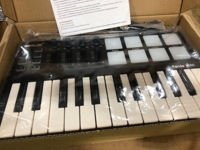Photo 3 of Btuty 25-Key MIDI Keyboard Panda mini Portable Mini Drum Pad MIDI Controller, USB