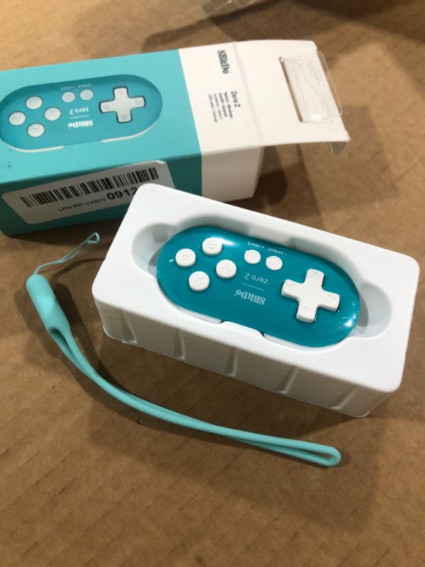 Photo 2 of 8Bitdo Zero 2 Mini Bluetooth Gamepad for Switch Windows Android MacOS Steam Raspberry Pi (Turquoise)