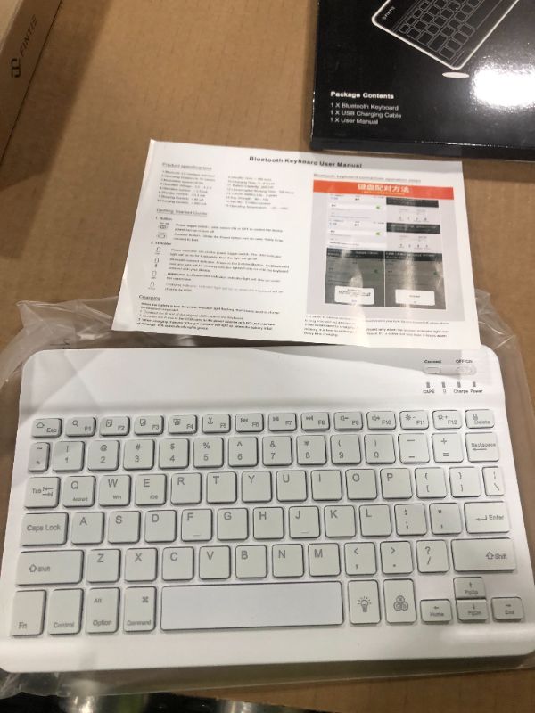 Photo 2 of Fintie 10.5-Inch Ultrathin (4mm) Wireless Bluetooth Keyboard for iPad Air 4th Gen 10.9", iPad 10.2", iPad Air 3rd Gen 10.5"/Air 2/Air, iPad Pro 11/Pro 10.5/Pro 9.7, iPad 9.7 Inch, iPad 2/3/4, White