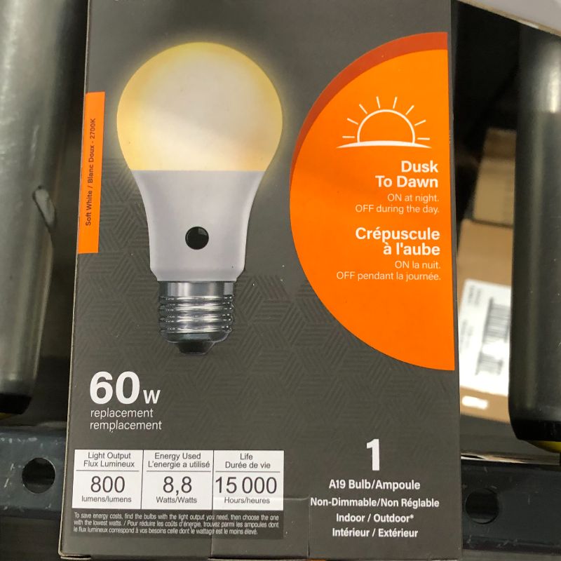 Photo 1 of 4 PACK - 60W Equivalent Soft White (2700K) A19 IntelliBulb Dusk to Dawn CEC Title 20 Compliant 90+ CRI LED Light Bulb