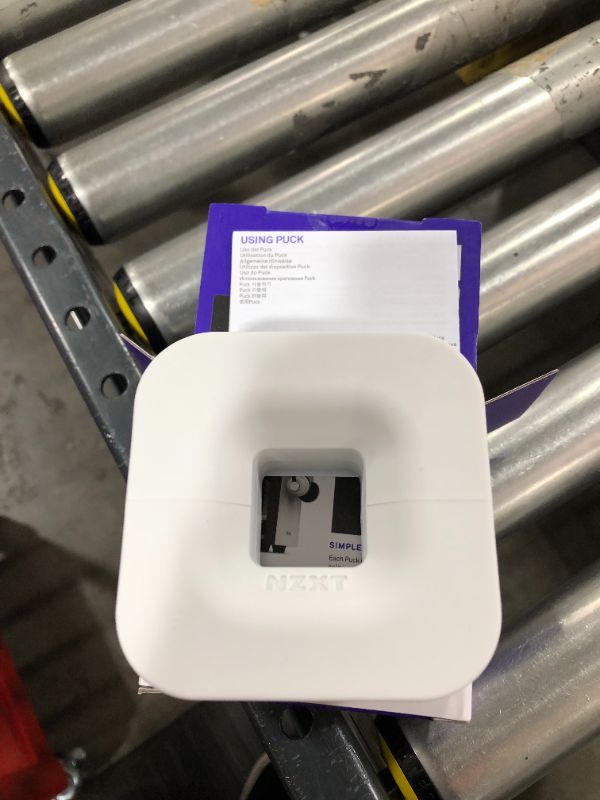 Photo 1 of NZXT Puck - BA-PUCKR-W1 - Cable Management and Headset Mount - Compact Size - Silicone Construction - Powerful Magnet for Computer Case Mounting - White
