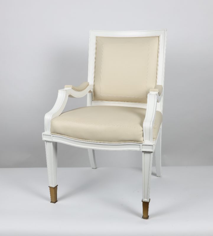 Photo 1 of FAUX LEATHER WHITE DINING CHAIR PADDED ARMS 21L X 23W X 37H INCHES