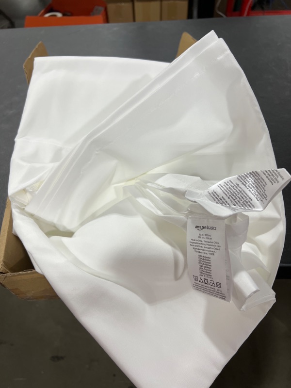 Photo 1 of Amazon Basics White Sheets, 1 Fitted Sheet, 1 Flat Sheet, 2 Pillow Cases 90x102in
