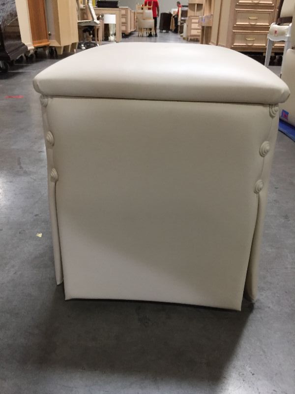 Photo 1 of CREME FAUX LEATHER OTTOMAN 17H X 15W INCHES