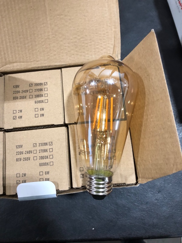 Photo 3 of ASOKO LED Dimmable Vintage Edison Led Bulbs 6W Antique Style Edison Light Bulbs, 2300K Warm White (Amber Gold Glass), Squarrel Cage Filament Vintage Light Bulb,ST64, E26 Base (2300K-6W-6PCS)
