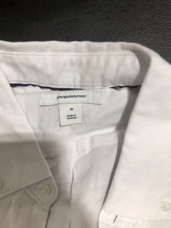 Photo 2 of AMAZON ESSENTIALS WHITE BUTTON UP 
SIZE M