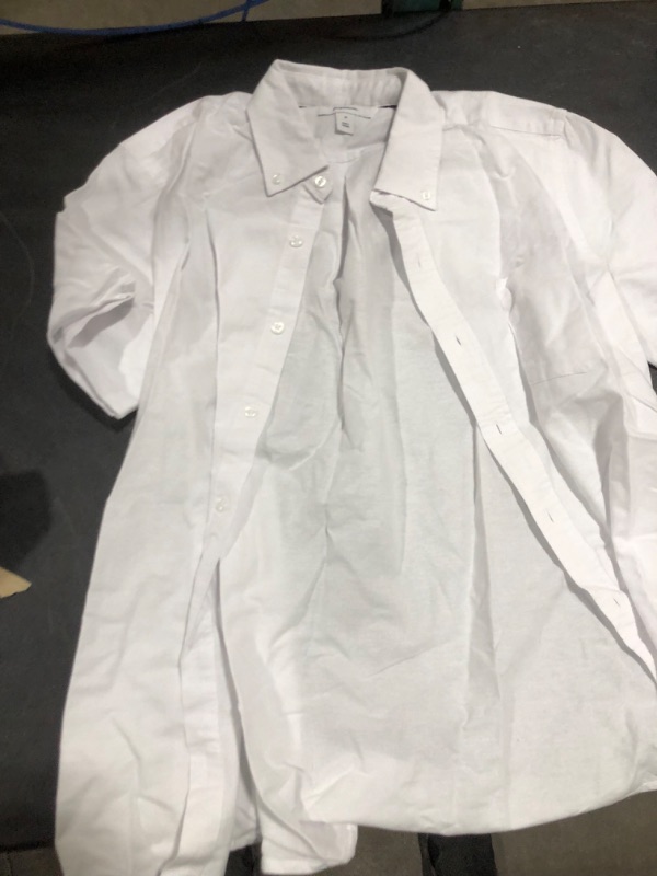 Photo 1 of AMAZON ESSENTIALS WHITE BUTTON UP 
SIZE M