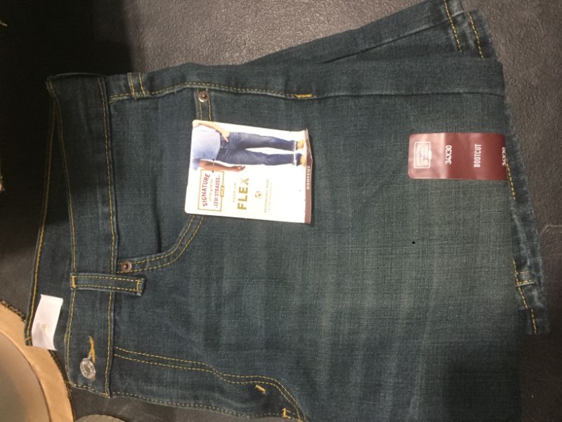 Photo 1 of MENS BOOTCUT JEANS 
SIZE 34X30