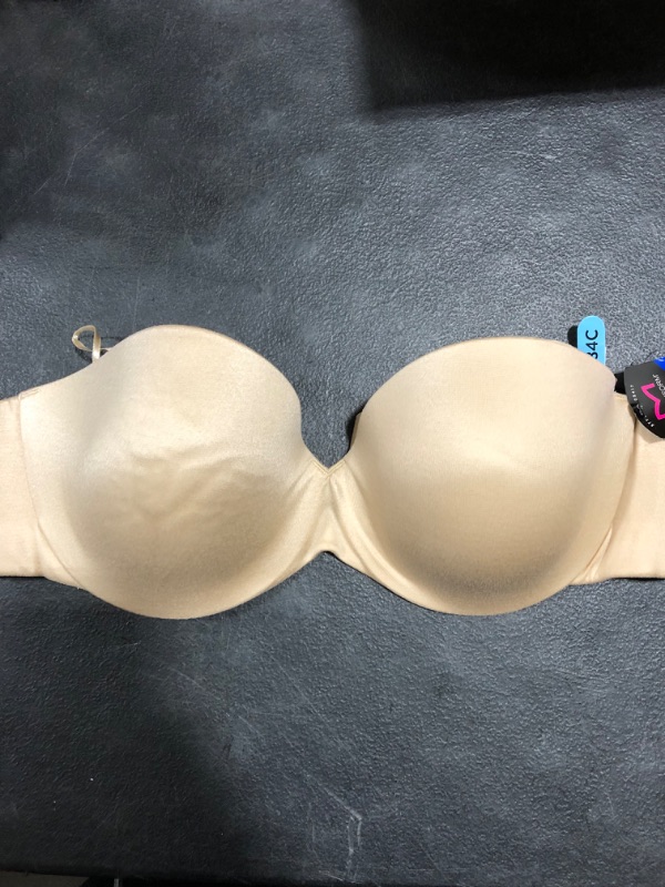 Photo 1 of WOMENS STRAPLESS BRA 
SIZE 34C BEIGE 