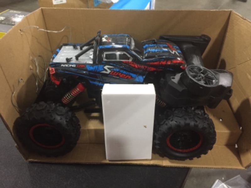 Photo 2 of Remote Control Truck RC Car 1: 12 Scale RC Truck 2.4Ghz Radio Remote Control Car RC Monster Vehicle Truck Crawler 4WD Off Road for Boys
